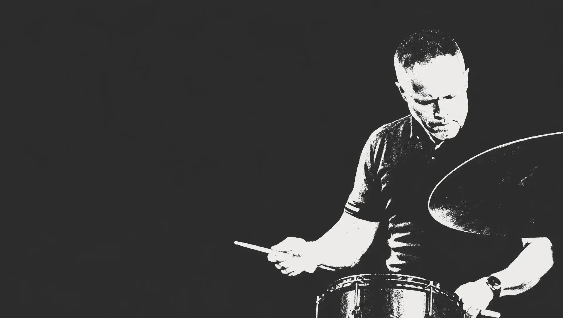 Kristian Braathen playing snare drum and ride cymbal, high-contrast black and white